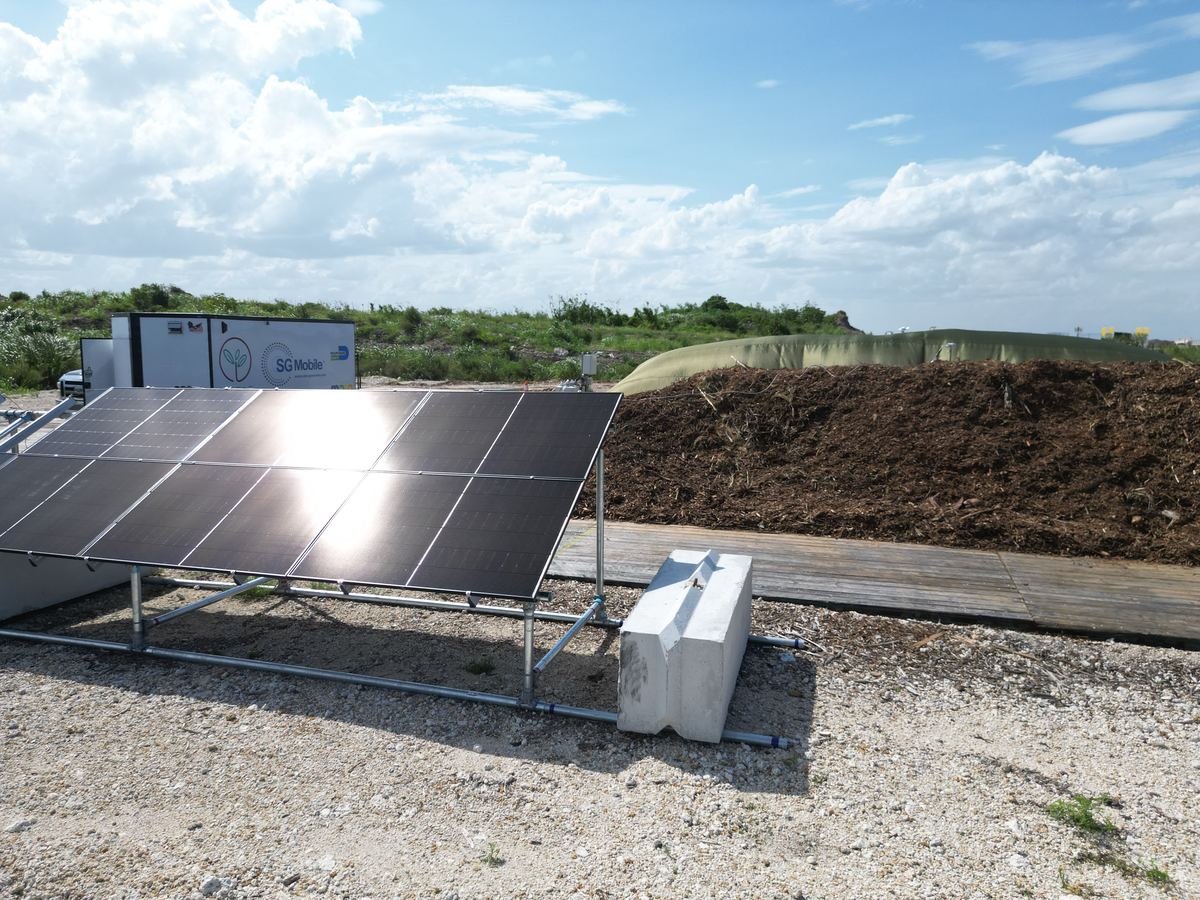 Solar panel array collecting energy to power compost aeration at the pilot site