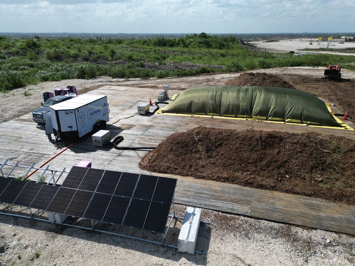 Solar panel array powering compost pile aeration and monitoring at the MDIA pilot site