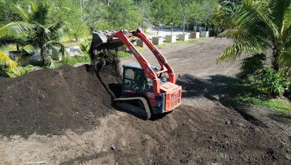 Soil being moved by machine