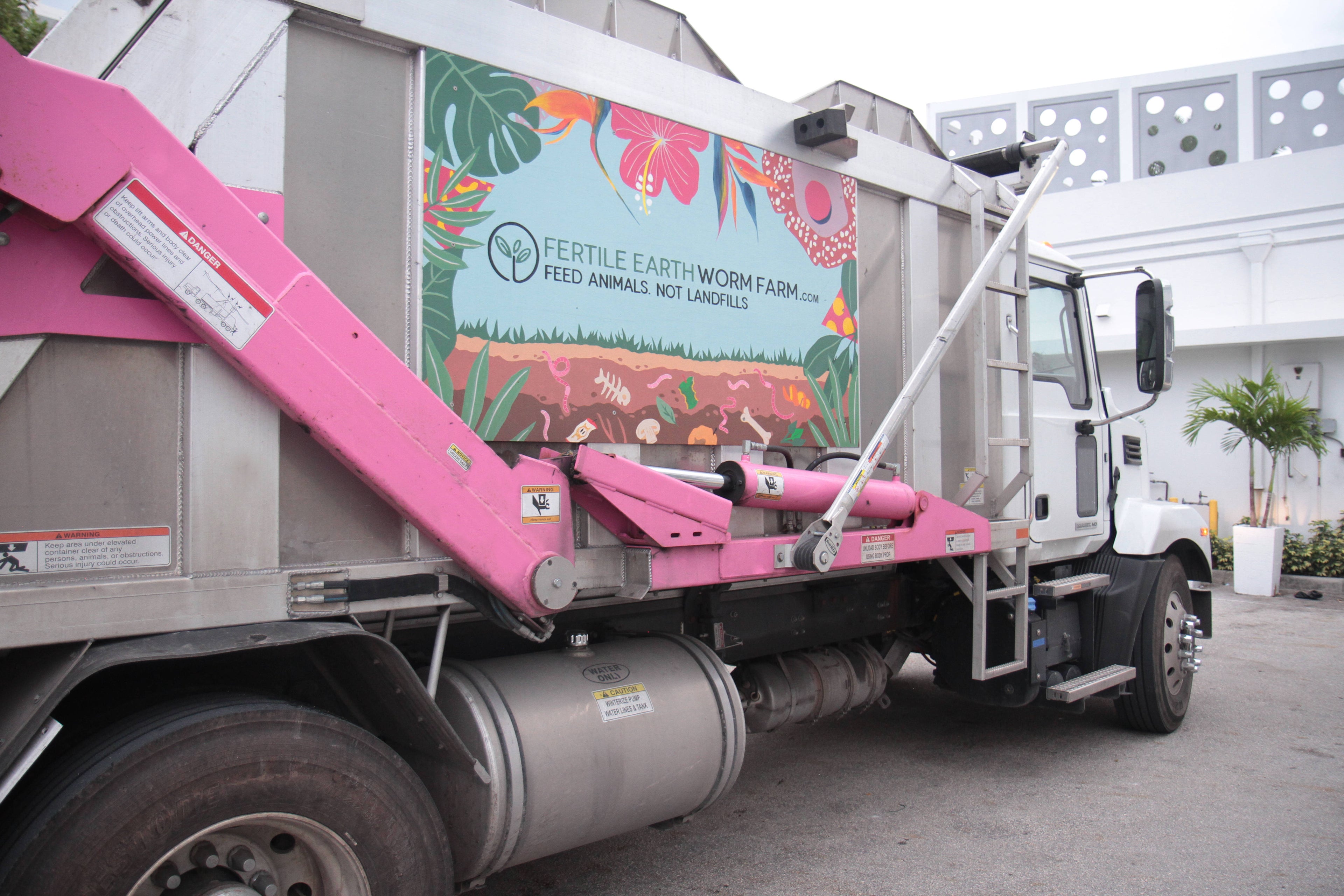 Side view of composting truck